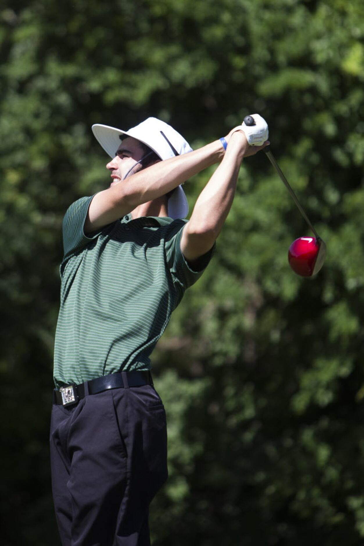 Southlake Carroll junior Trent Hill makes a drive on the sixth hole during the UIL 5A State...