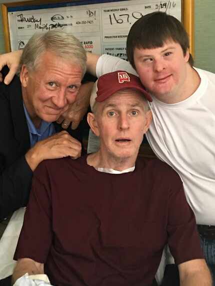 Former Alabama football players Andy Gothard (left) and Thad Flanagan (center) with...