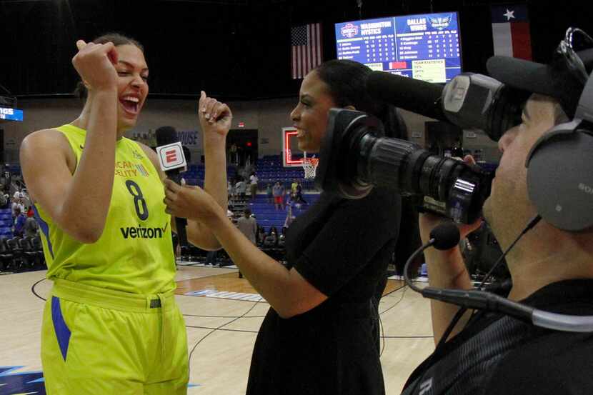 Dallas Wings center Liz Cambage (8) was all smiles during a television  interview following...