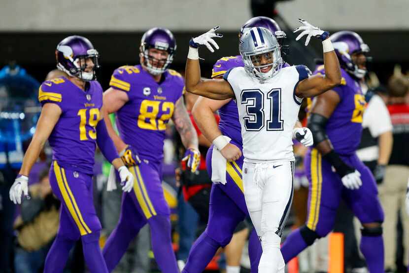 Dallas Cowboys free safety Byron Jones (31) gets fired up after the Minnesota Vikings scored...