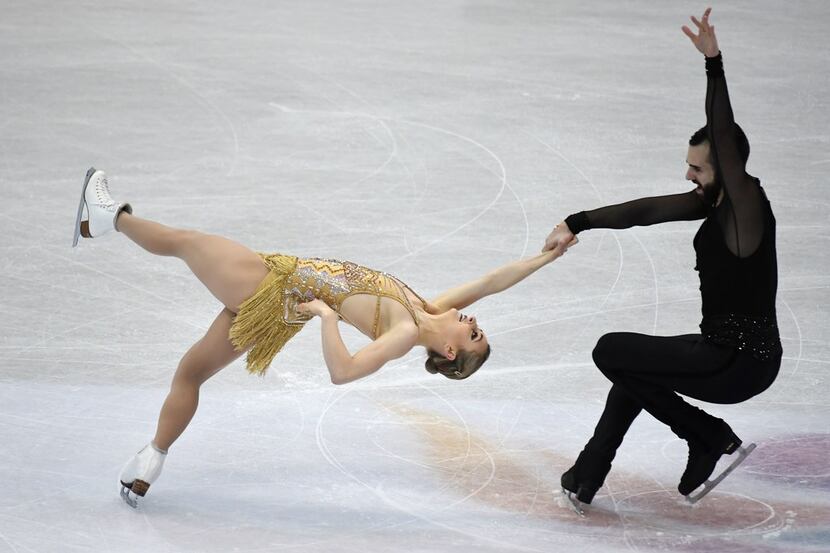 CORRECTION - Ashley Cain (L) and Timothy Leduc of the US perform during the pairs free...