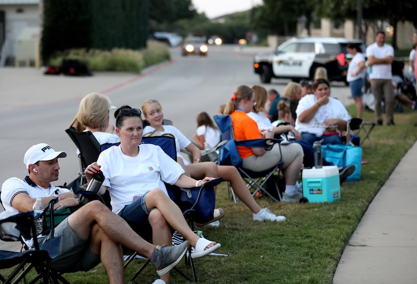 People gathered outside the council meeting in Fairview, Texas, on Tuesday, August 6, 2024....