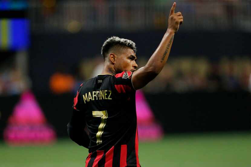 Atlanta United forward Josef Martinez looks to the crowd after scoring a goal during the...