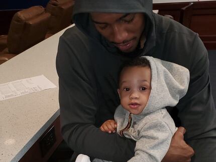 SMU forward Isiaha Mike holds his son, Kamryn. Mike entered the NBA draft process and has...