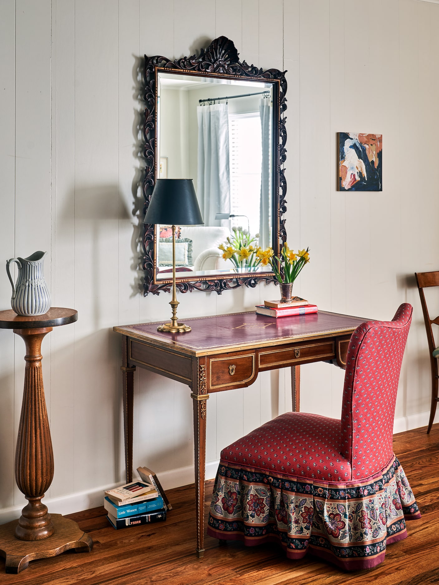 Here, Windle pairs a French writing table (circa 1870) from Nick Brock Antiques and a mirror...