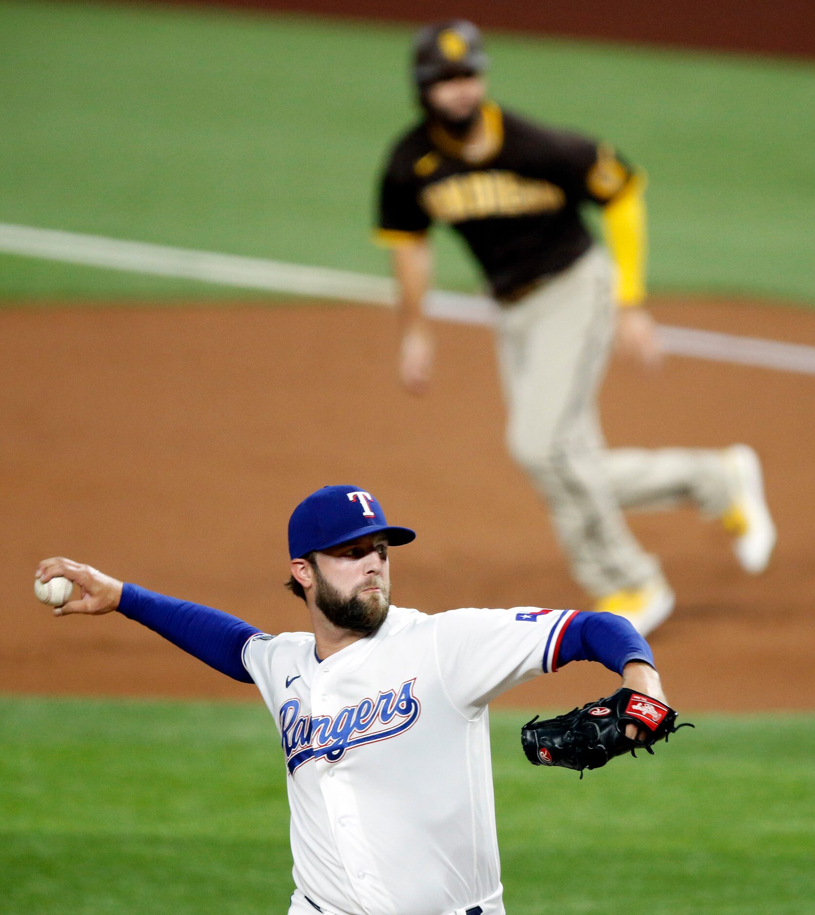 Texas Rangers starting pitcher Jordan Lyles (24) throws a pitch as San Diego Padres Eric...