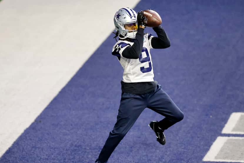 Dallas Cowboys wide receiver KaVontae Turpin (9) caches a pass in the back of the end zone...