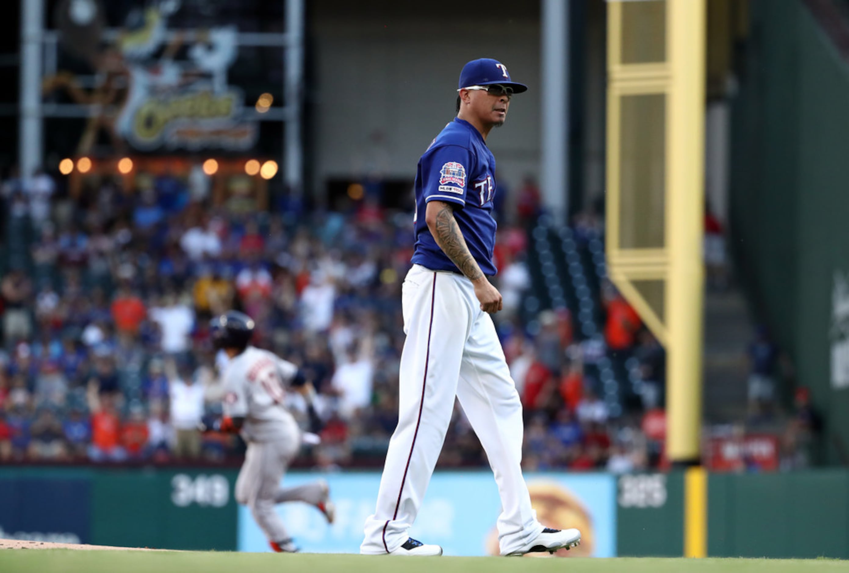 Rangers pitcher Jesse Chavez offered home plate umpire Rob Drake his glasses  after two controversial non-strike calls