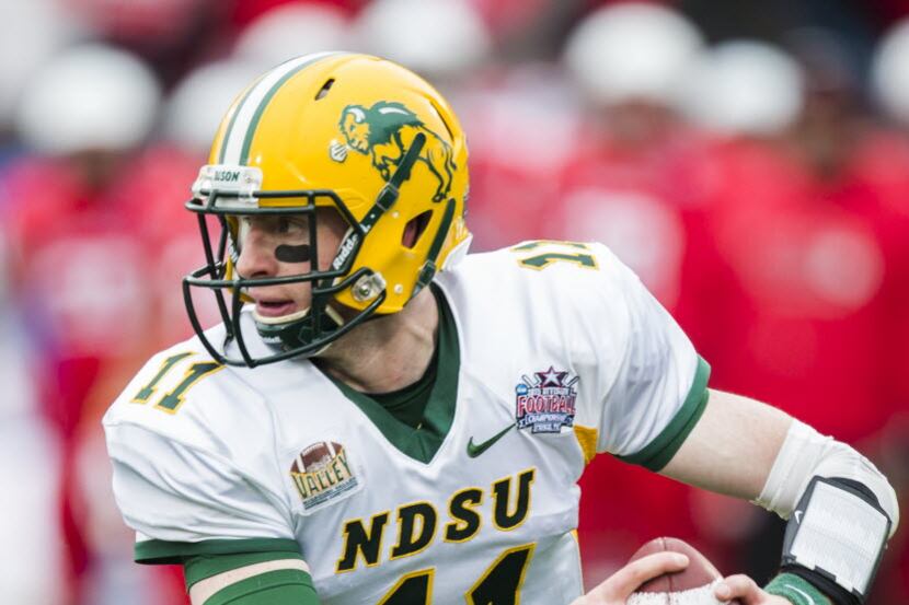 North Dakota State Bison quarterback Carson Wentz (11) runs the ball during the first half...