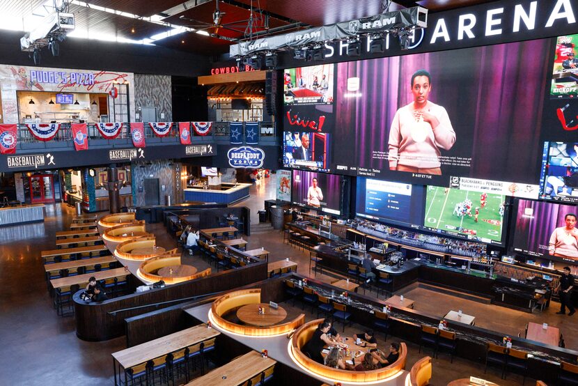 The 100-foot TV screen is a major draw inside Texas Live!'s namesake restaurant and sports bar.