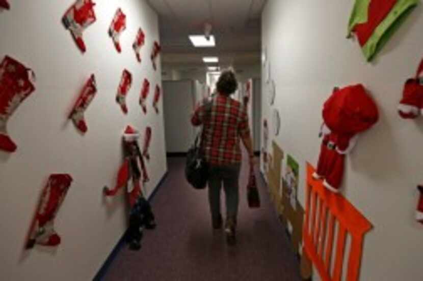 A Child Protective Services investigator leaves her office to interview a family in Dallas....