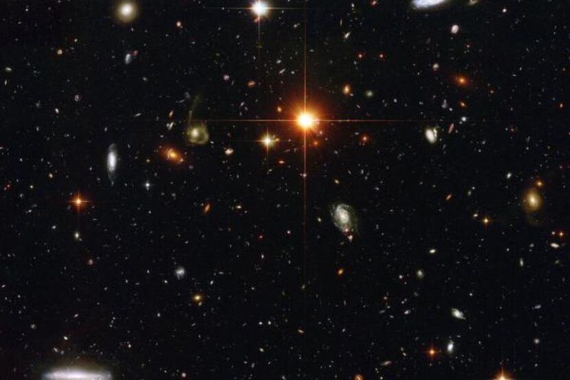 

 
An image from the Hubble Space Telescope shows a corridor of galaxies similar to our...