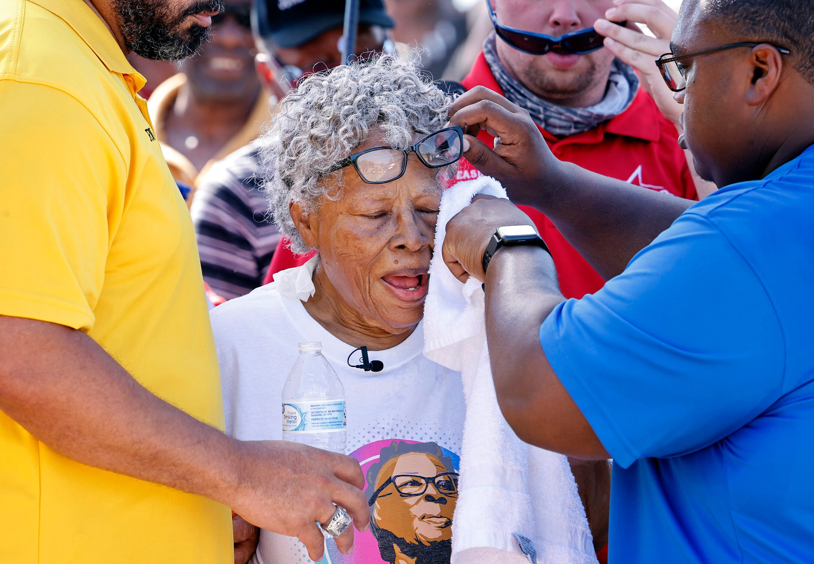 Opal Lee made several water and cooling stops as she received a shaded escort during her hot...