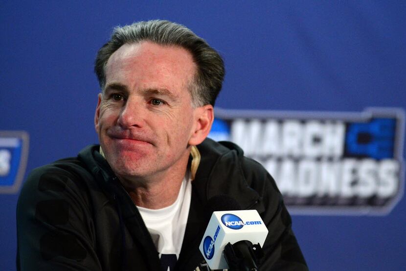 Mar 17, 2016; St. Louis, MO, USA; Pittsburgh Panthers head coach Jamie Dixon talks with the...