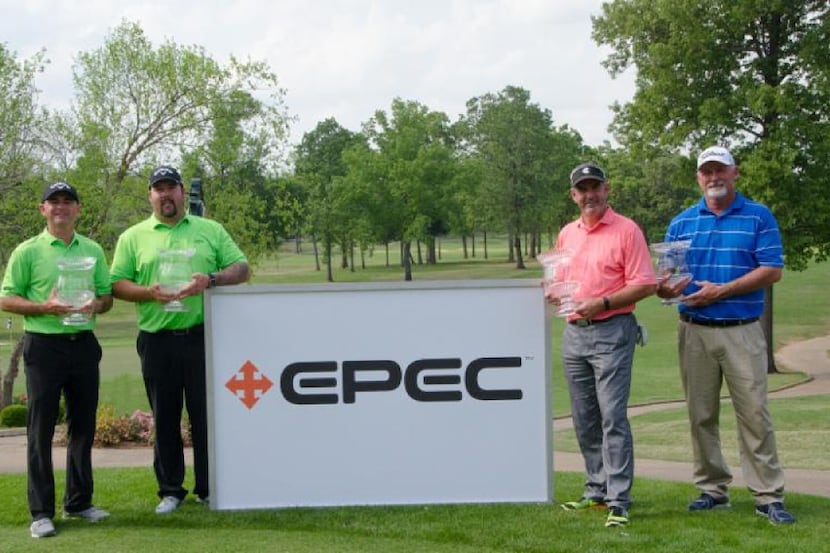 From left, Greg Gregory, Ben Kern, Paul Earnest and Carl Worley Jr. pose with their trophies...