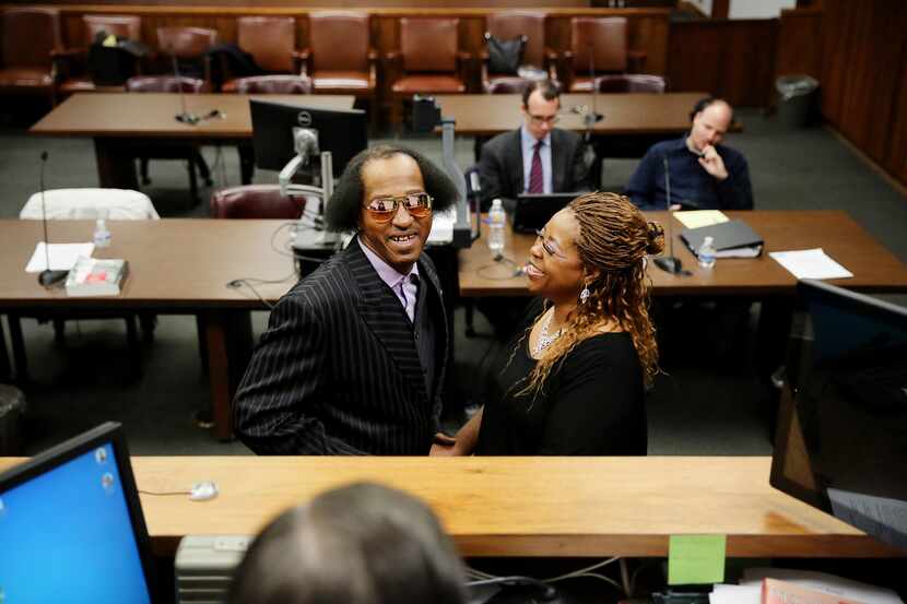 William Hinton and Marquetta Tilley, both of Dallas, are married in the court room of judge...