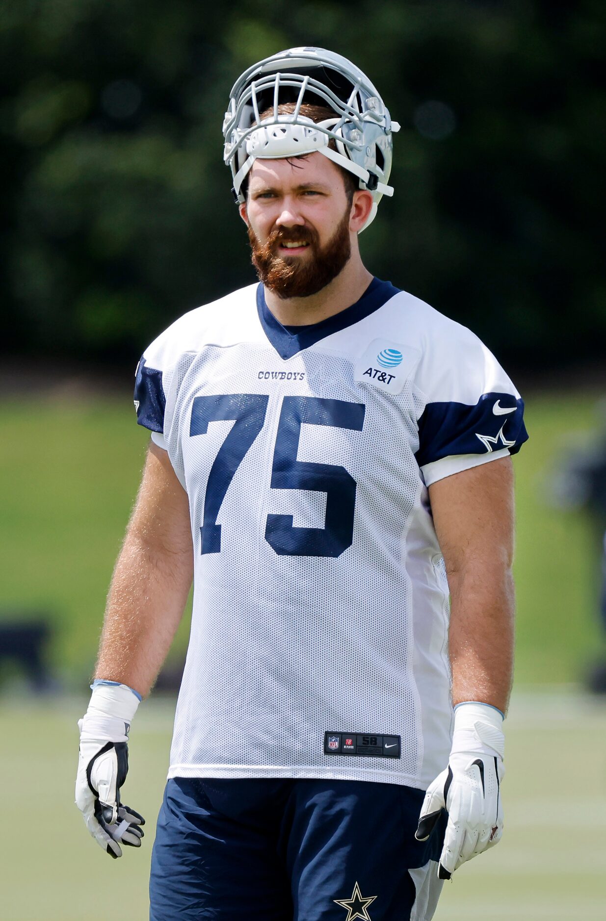 Dallas Cowboys offensive tackle Josh Ball (75) waits for practice to start at The Star in...