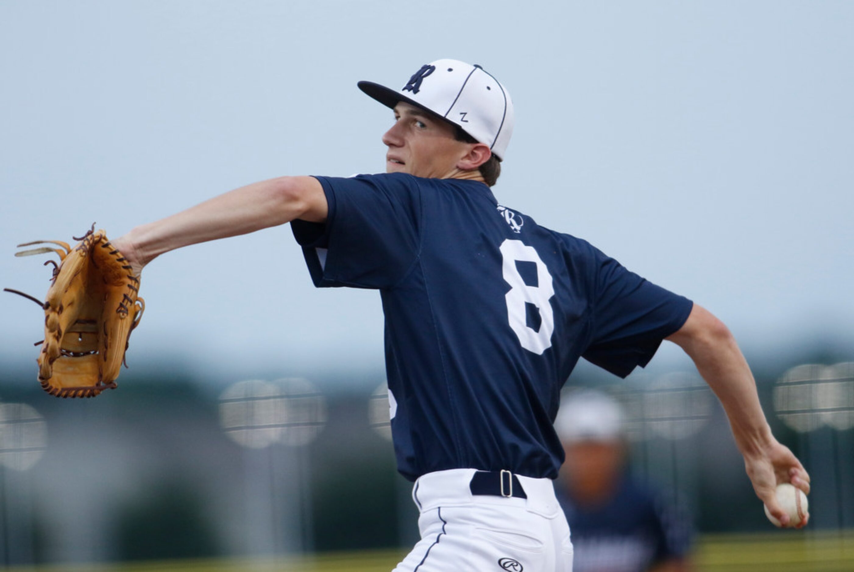 Richland pitcher Drew Henderson (8) delivers a pitch to a Northwest Eaton batter during the...