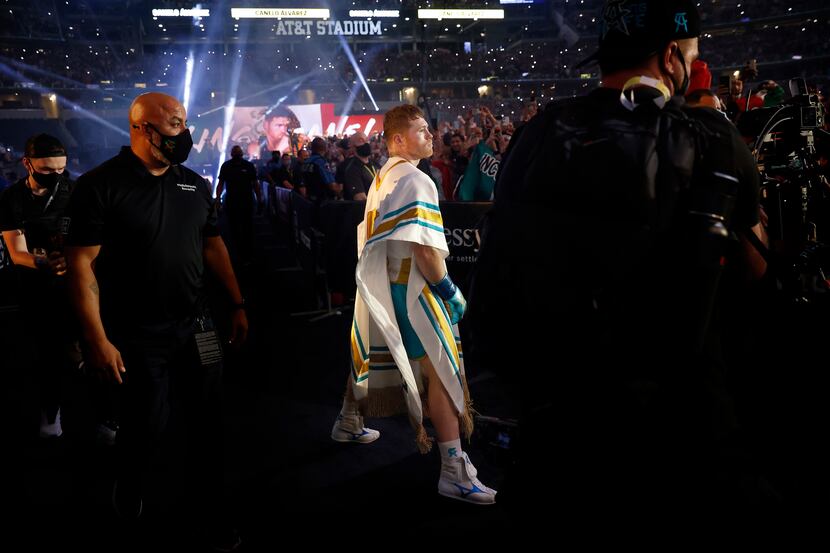 Boxer Canelo Alvarez struts to the ring as he's introduced to a mostly favorable crowd...