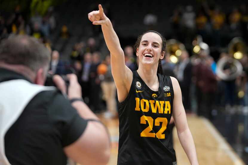 Iowa's Caitlin Clark celebrates after an NCAA Women's Final Four semifinals basketball game...