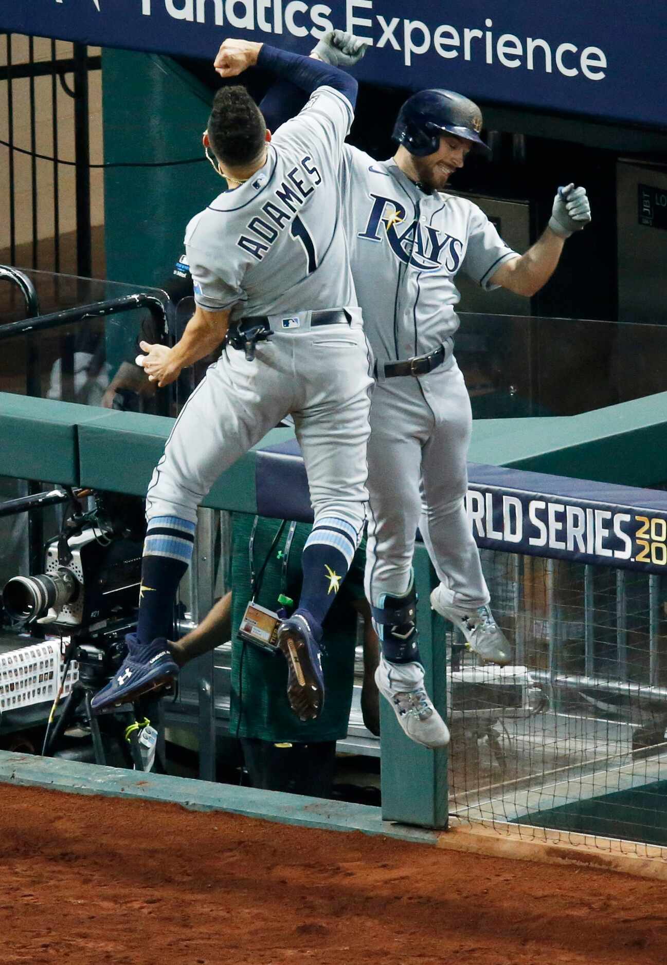 Tampa Bay Rays second baseman Brandon Lowe (8) and Tampa Bay Rays shortstop Willy Adames (1)...
