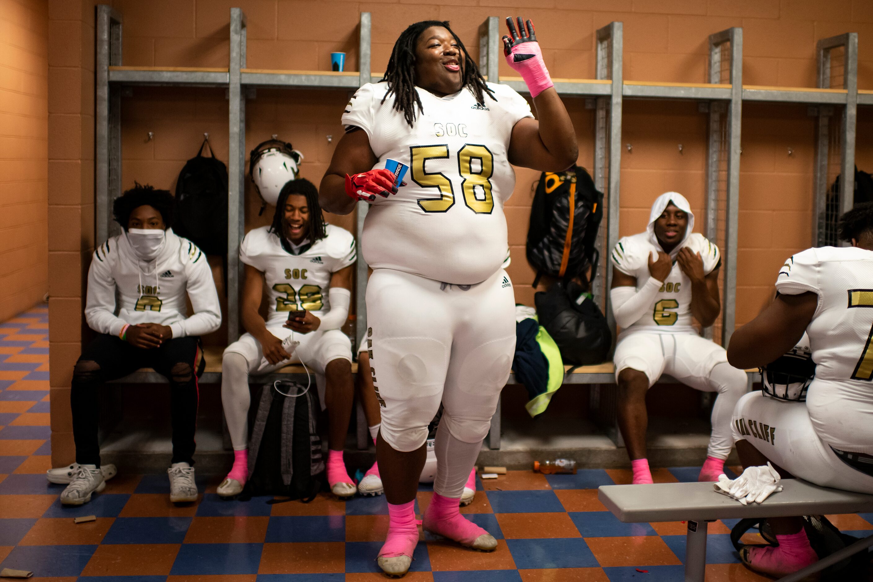 South Oak Cliff junior Brione Ramsey-Brooks (58) dances with his teammates during halftime...