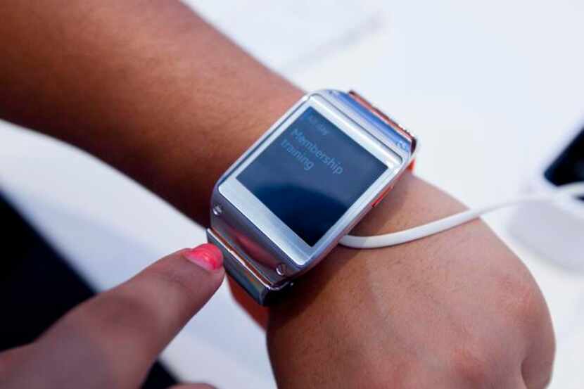 
An attendee looks at a new Samsung Galaxy Gear watch during an event in Times Square last...