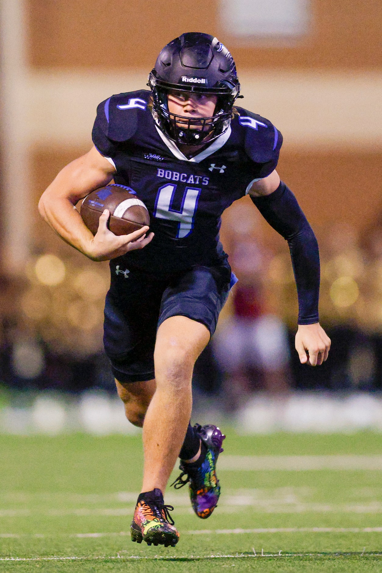 Trophy Club Byron Nelson’s Gran Bizjck (4) runs the ball during the first half of a game...