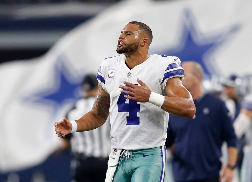 Dallas Cowboys quarterback Dak Prescott (4) celebrates after a made field goal by Dallas...