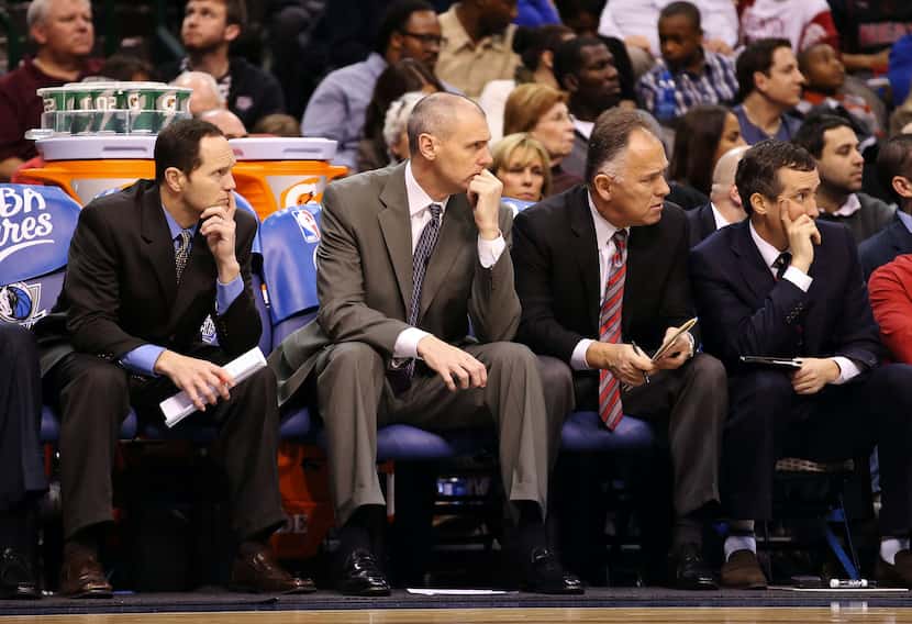 Dec 20, 2012; Dallas, Tx, USA; Dallas Mavericks head coach Rick Carlisle (second from left)...