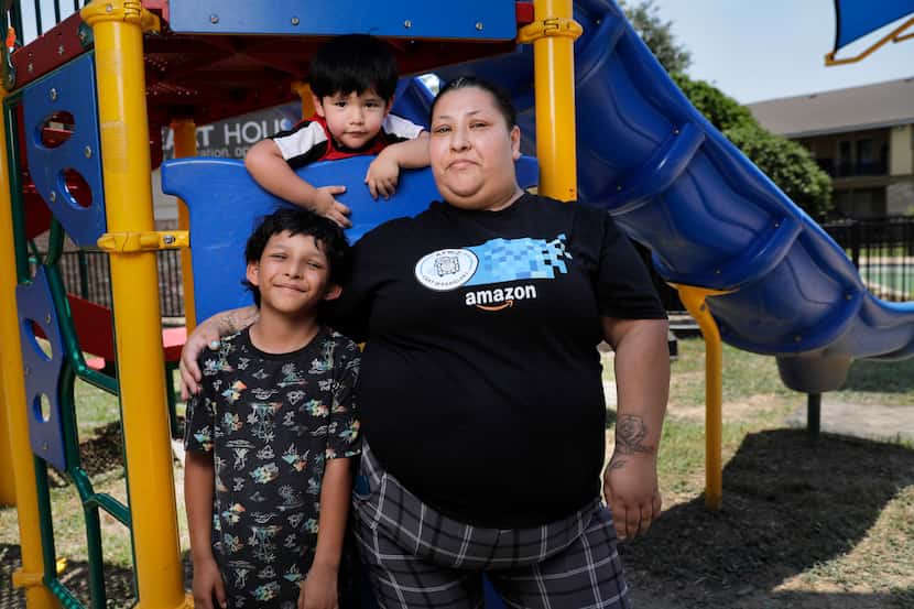 Victoria Halstead with two of her children, Jovani, 8, and Ismael, 3, on June 22 at the...
