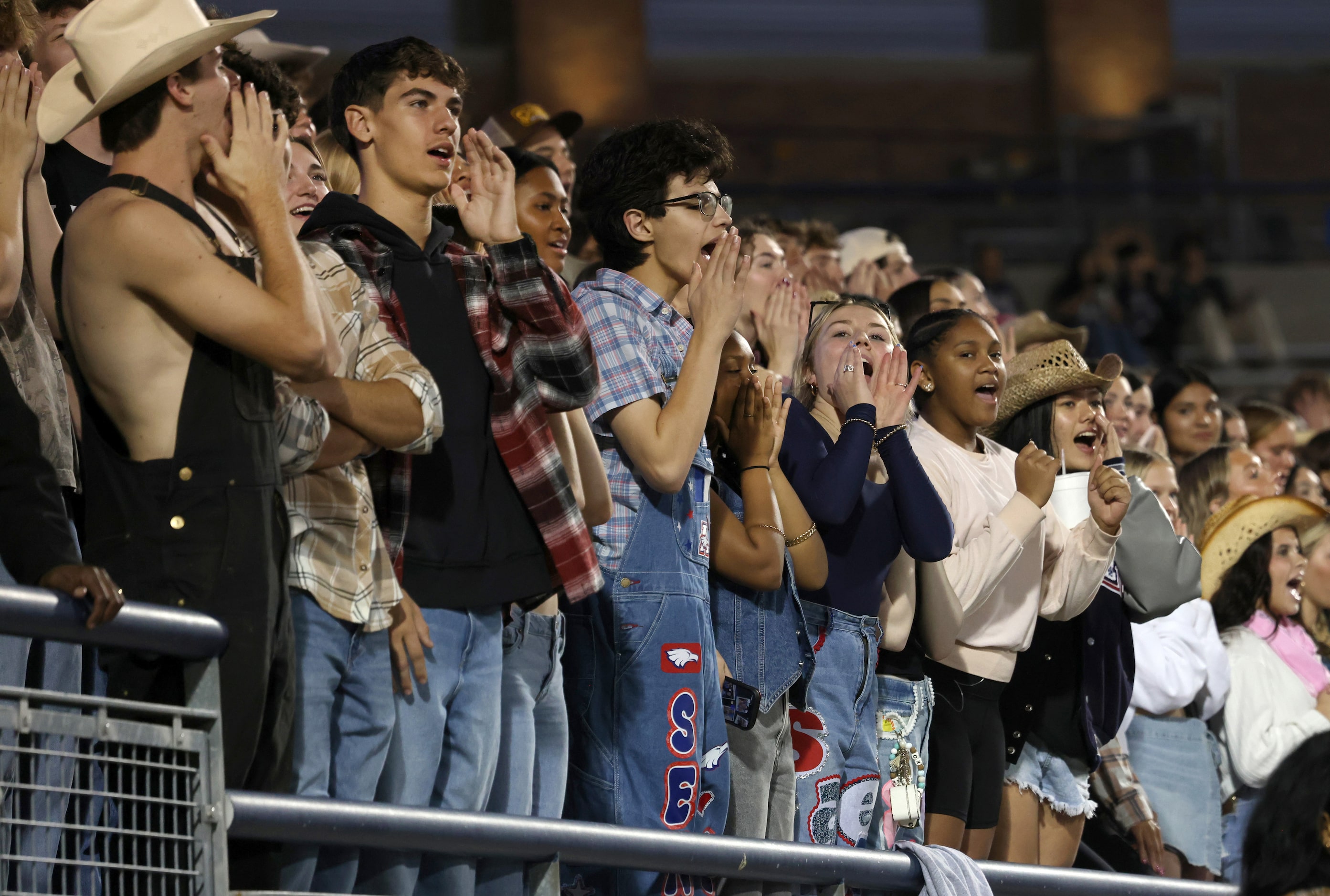 Allen students vocalize their support for the Eagles during first quarter action against...