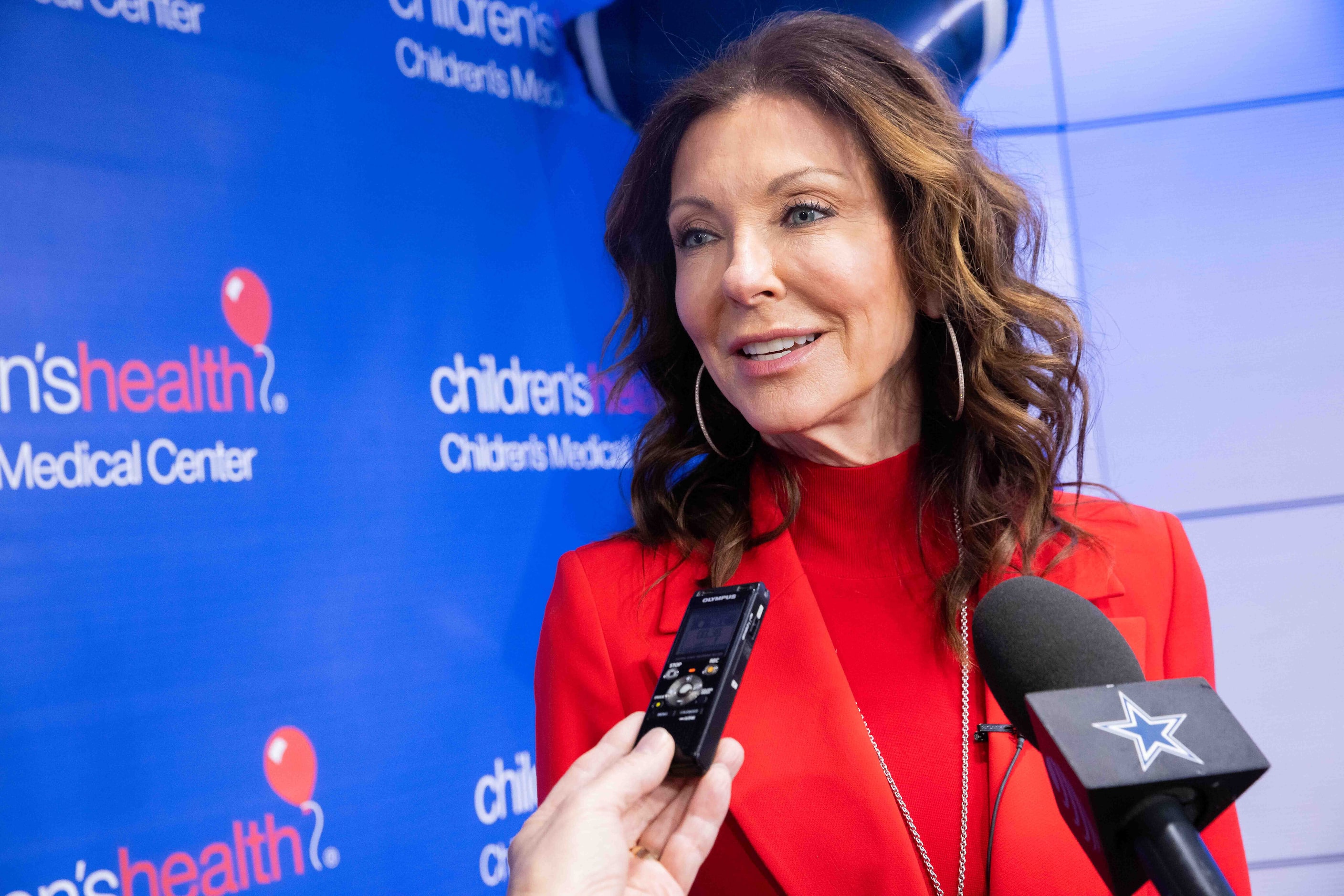 Dallas Cowboys executive vice president and chief brand officer Charlotte Jones talks to the...