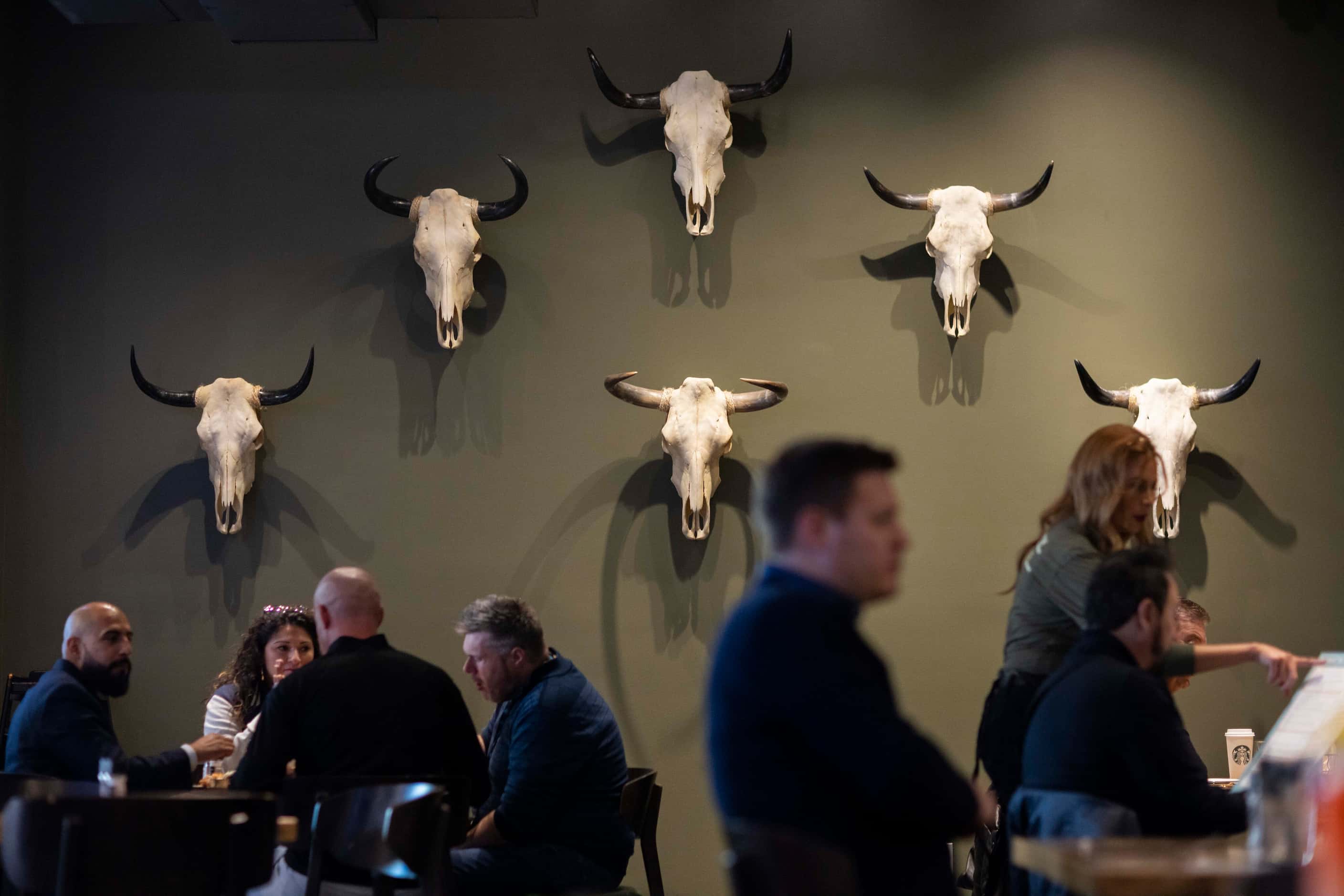 Skulls adorn the wall of the new Cowboy Chow restaurant at the AT&T Discovery District in...