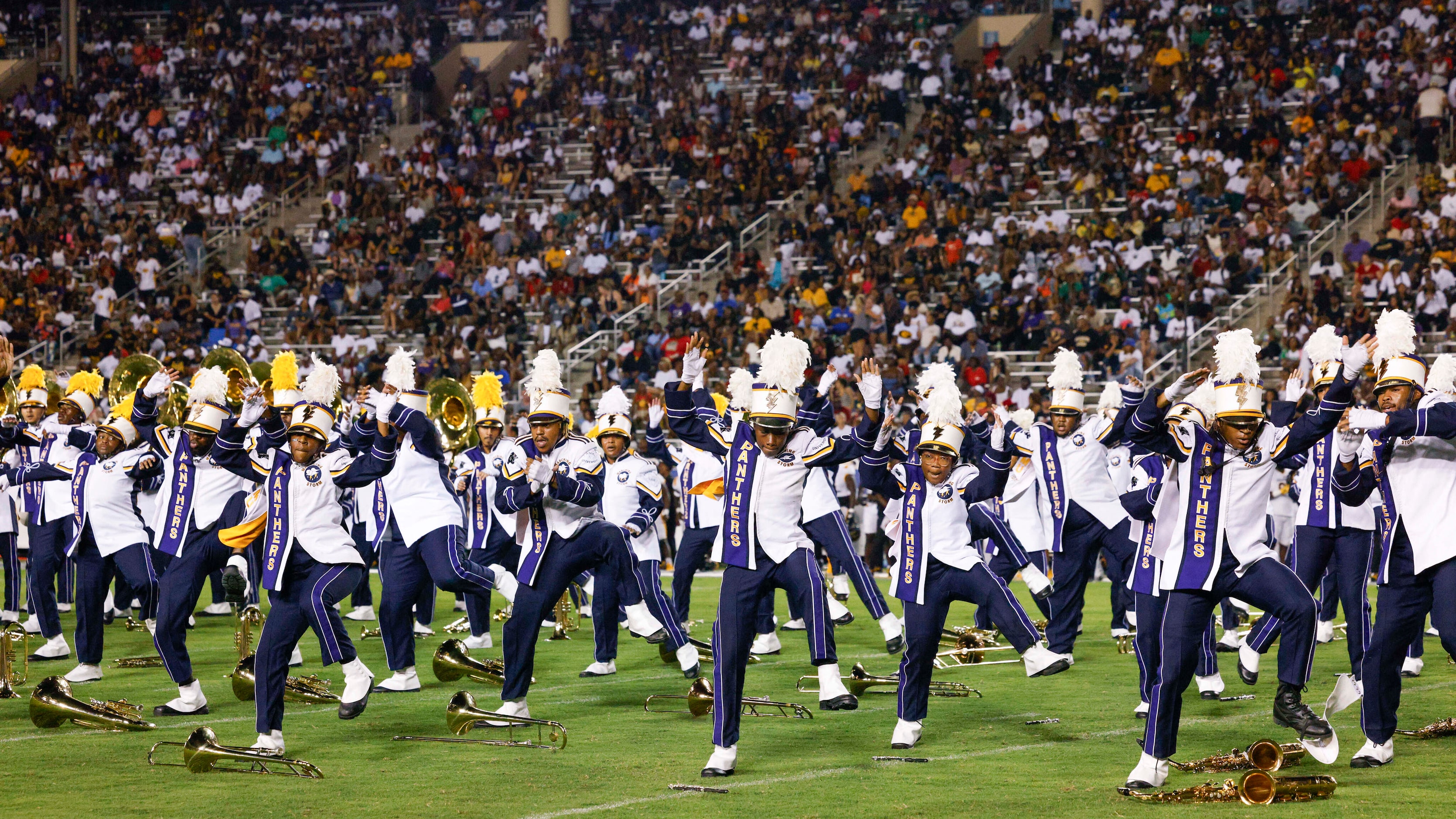 The Prairie View A&M marching band performs during halftime at the State Fair Classic at the...