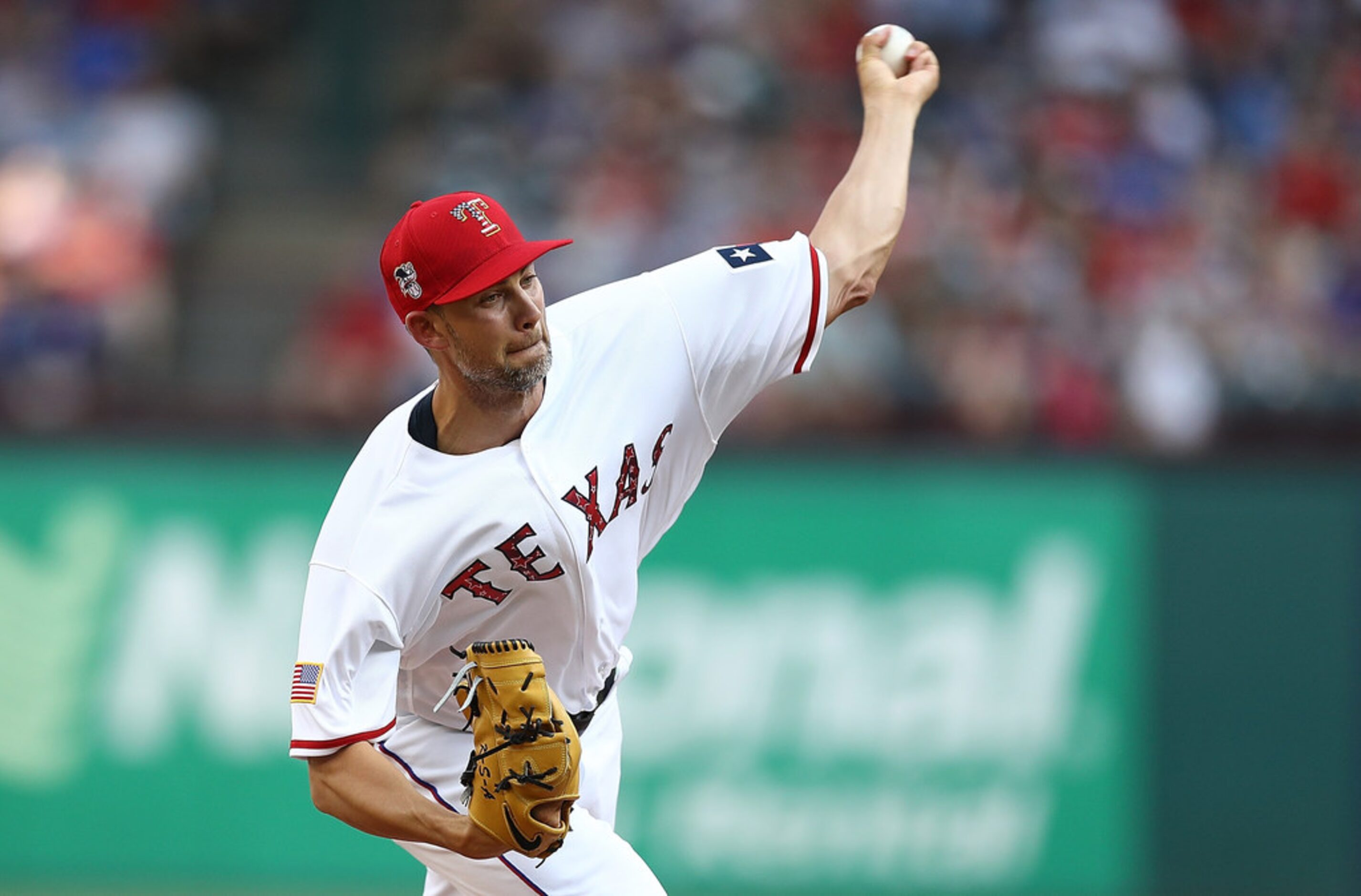 ARLINGTON, TX - JULY 04:  Mike Minor #36 of the Texas Rangers throws against the Houston...