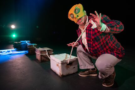 David Lozano dons an insect mask in Cara Mia Theatre's 2023 premiere of "Orígenes/Origins."