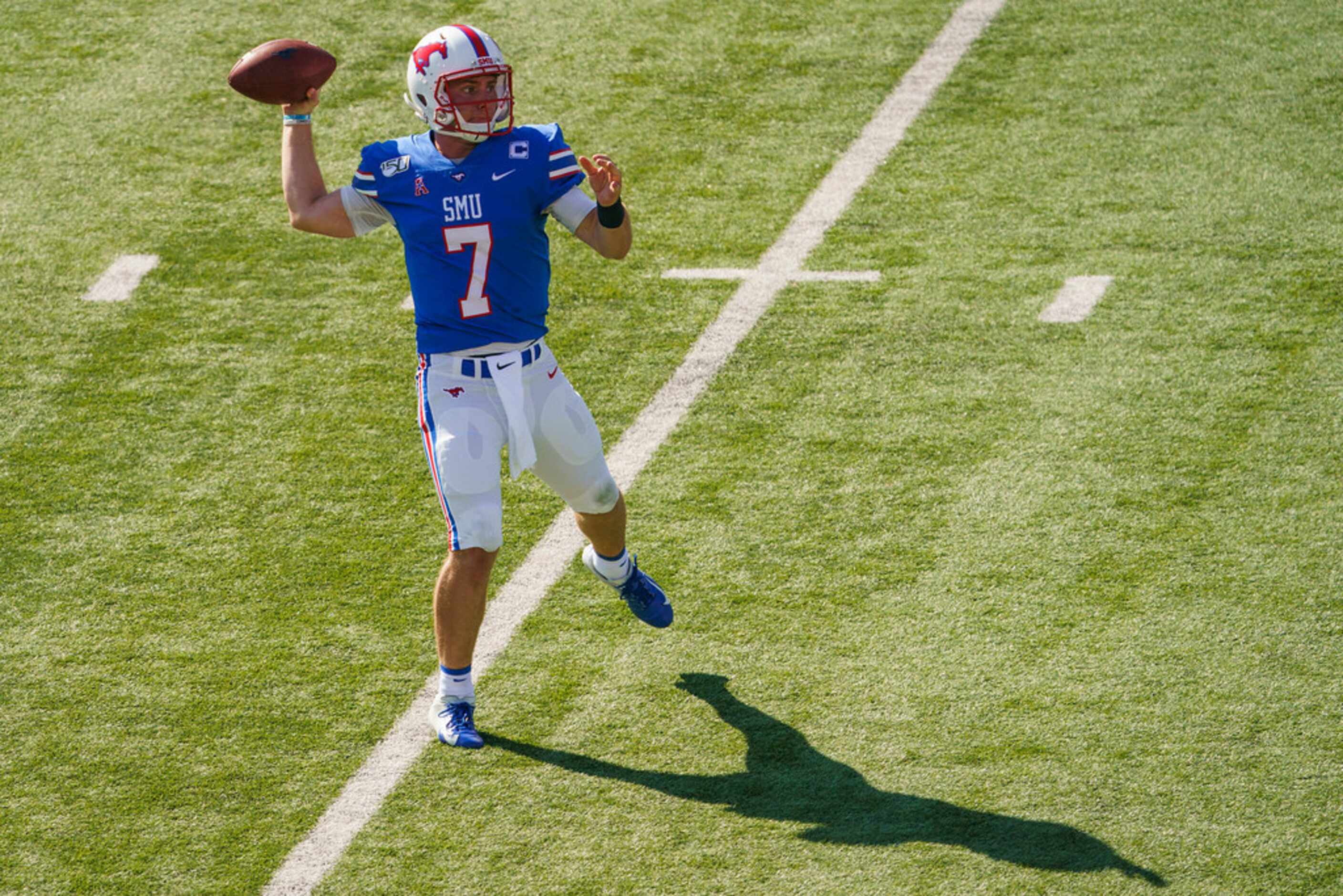 SMU quarterback Shane Buechele (7) throws a pass during the first half of an NCAA football...