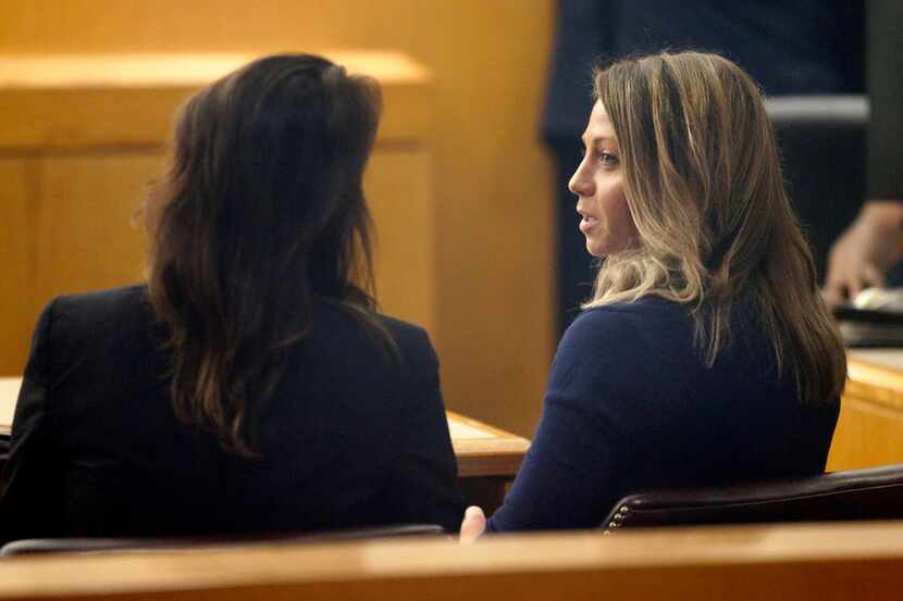 Fired Dallas police Officer Amber Guyger (right) appeared Monday at the Frank Crowley Courts...