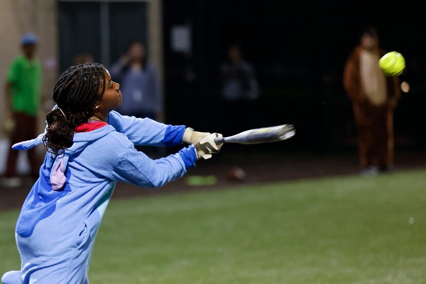 Ali Williams, a junior at Mansfield Timberview, takes a cut during the annual Halloween...