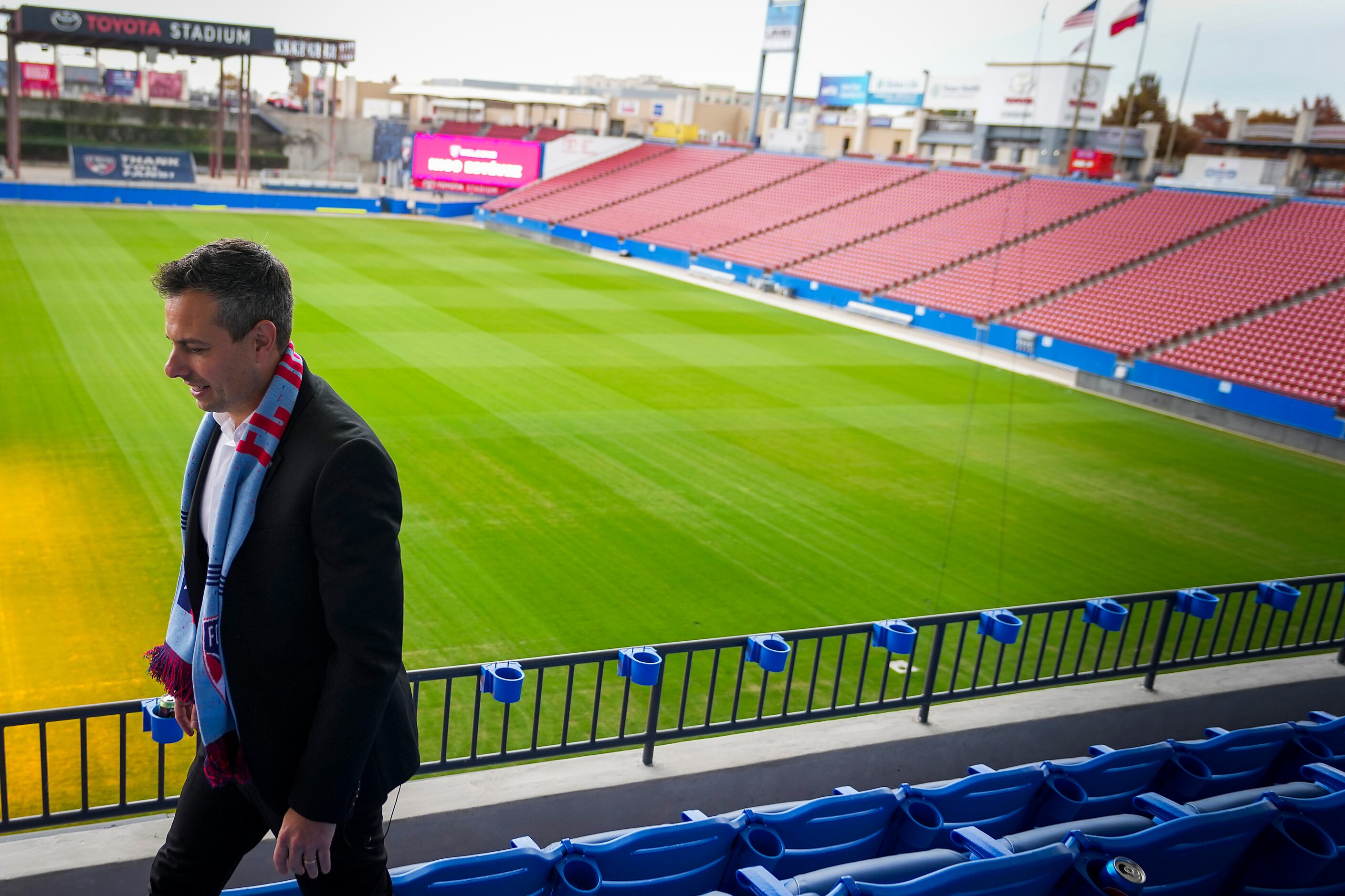 New FC Dallas head coach Nico Estévez walks through the stands at Toyota Stadium after his...