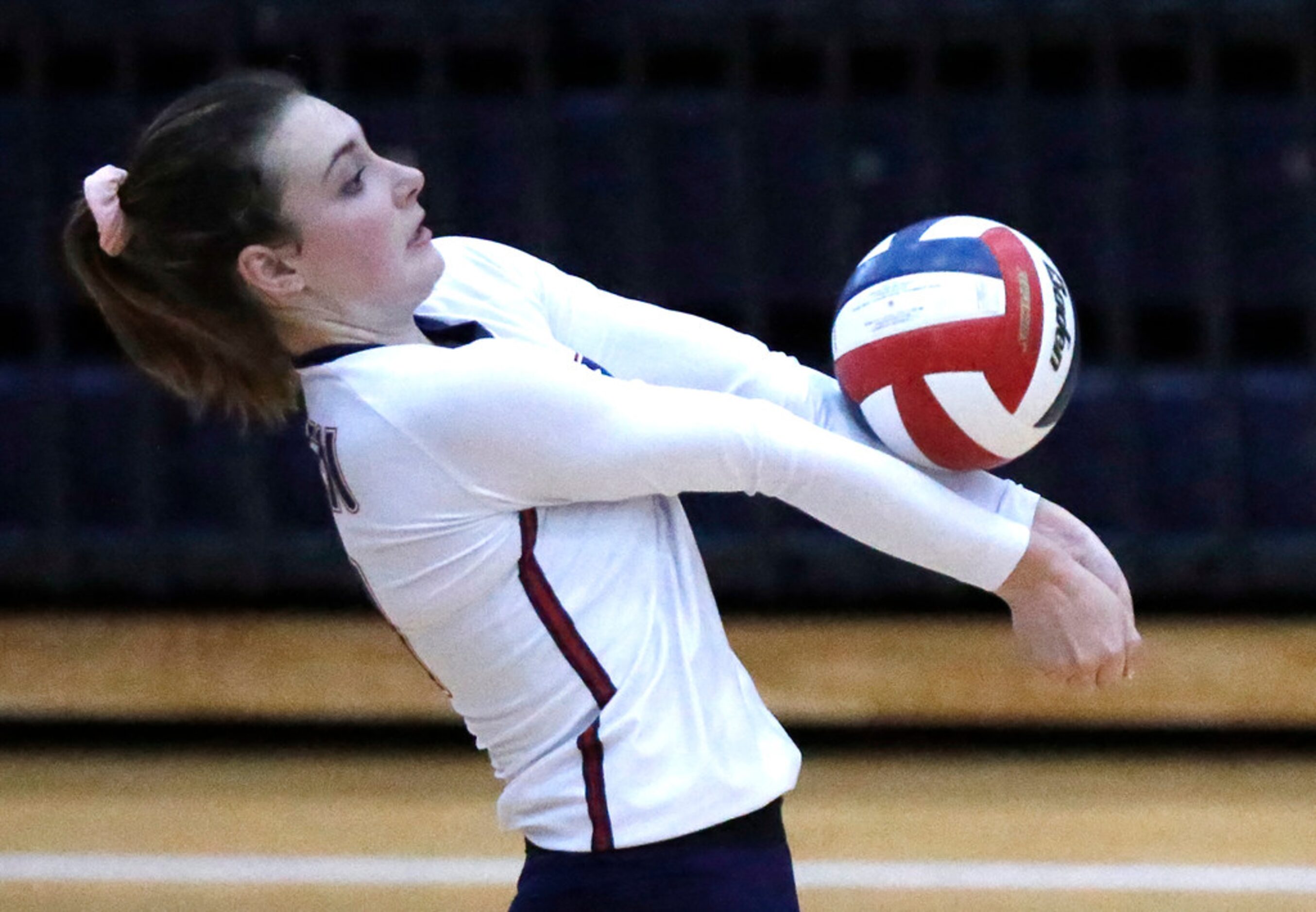 Allen High Schoolâs Maddie Wendland (14) passes the ball during game two as Allen High...