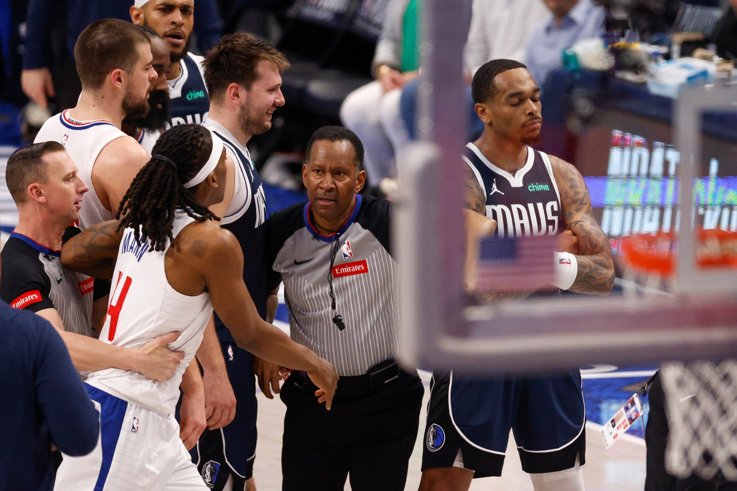 Dallas Mavericks forward P.J. Washington (25) stands his ground after an interaction with LA...