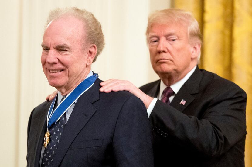 President Donald Trump awards former professional football player Roger Staubach the Medal...