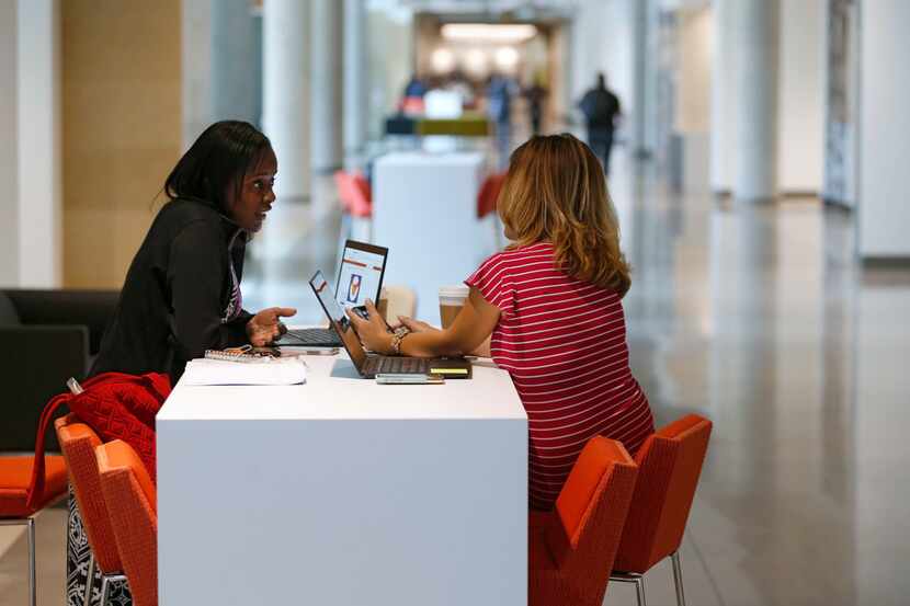 Toyota's Kim Williams (left) and Megumi Leali work together at Toyota Motors North America...