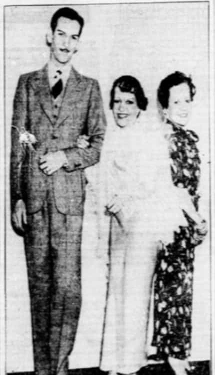 July 1936: The bride, groom and sister of the bride model their wedding outfits.