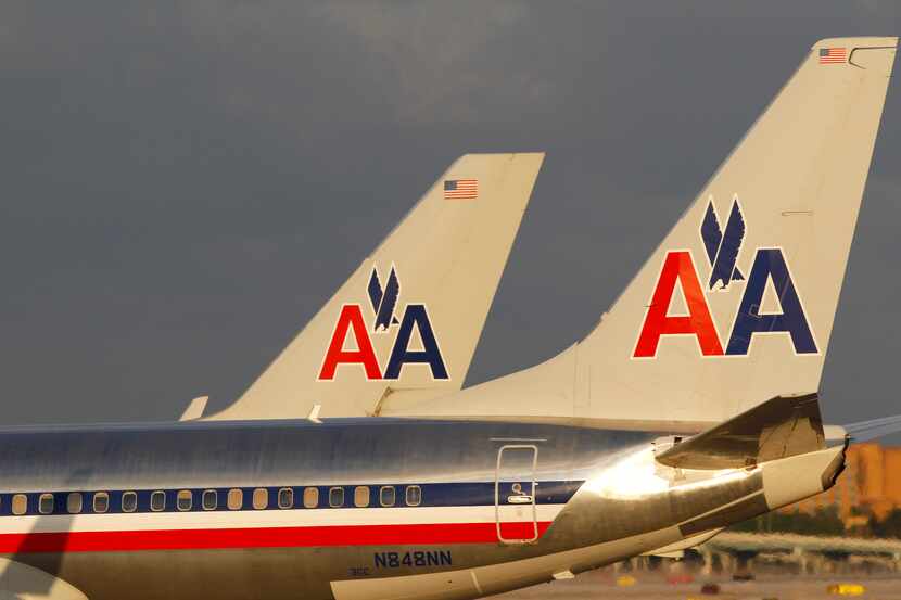 The parent of American Airlines reported one of its best third quarters ever Thursday, even...