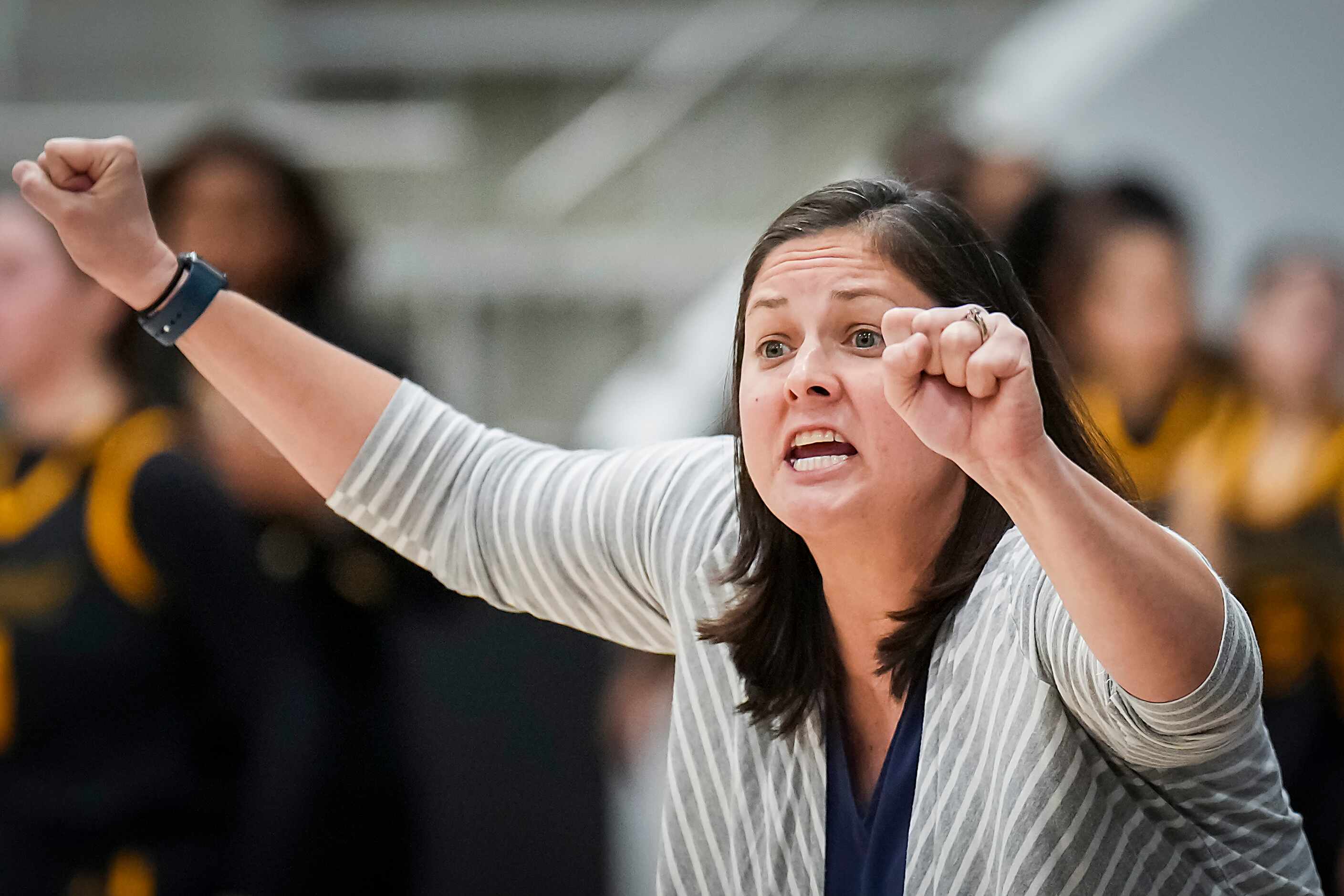 Wylie East head coach Meaghan Hodapp signals a play during a Class 5A first-round high...