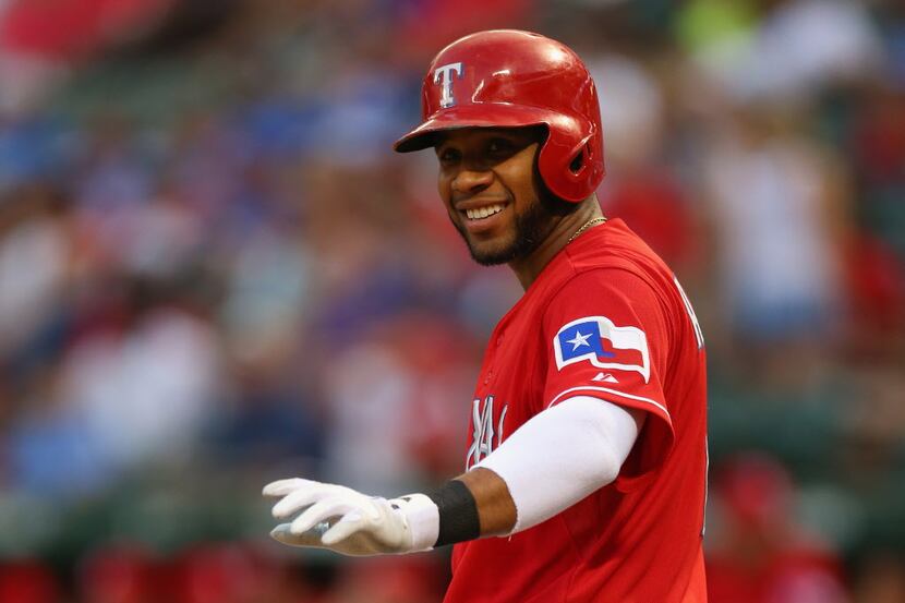 Elvis Andrus of the Texas Rangers waves during play against the Pittsburgh Pirates at...