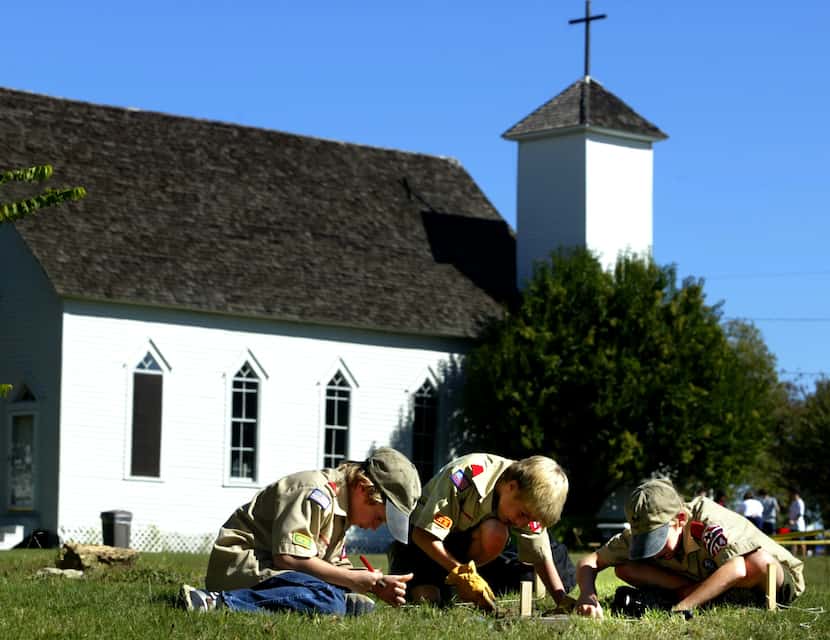Members of Boy Scout Troop 714 dig for artifacts at the former Frankford town site at 17405...